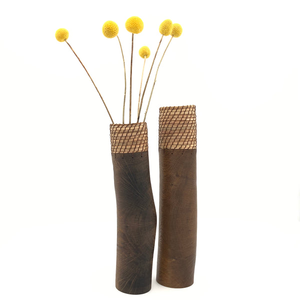 Dark brown wood vase with warp 11”
